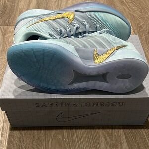 Sabrina 3 Nike Light Blue and Gold Sneakers